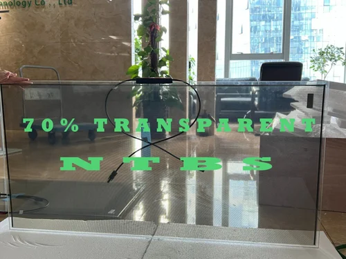 Transparent glass solar panels for buildings